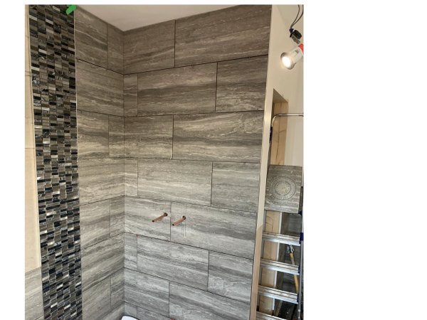 Wall tiles and shower plumbing